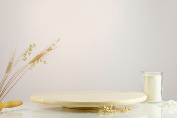 Empty product display on light gradient background for presentation pastries or bakery. Wooden podium with ears of rye, wheat and glass of flour. Scene stage showcase for product, promotion sale