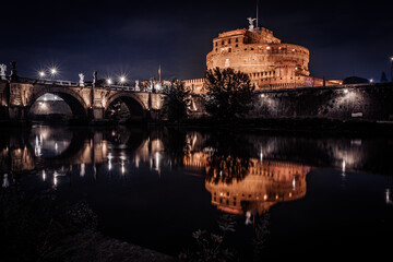 Night view of Castel Sant'Angelo from the Tiber River Rome Italy