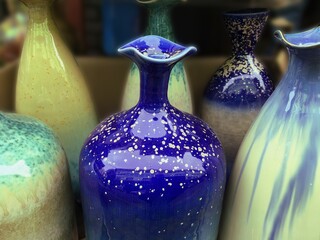 Collection of colorful beautiful ceramic vases.