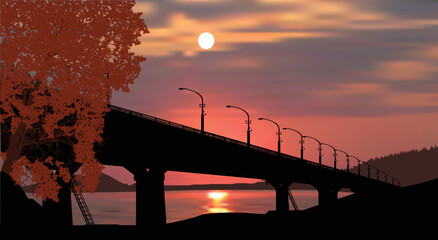 long bridge above lake at pink sunset