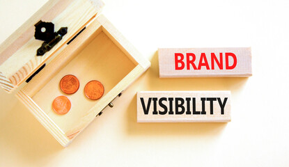 Brand visibility symbol. Concept words Brand visibility on wooden blocks. Beautiful white table...
