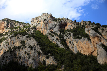 Bottom view of the Maiella massif and entrance to the Cavallone Caves, Lama dei Peligni, Taranta Valley, Abruzzo, Italy