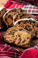 Fototapeta na wymiar Stollen with dried fruits and nuts. Christmas or New Year concept