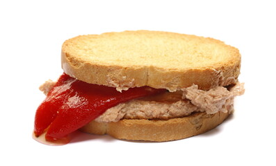 Turkey pate spread on slice bread with red pepper isolated on white 