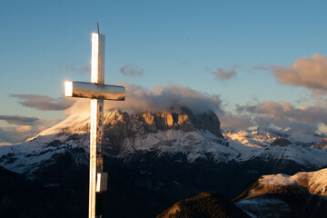 sunset in the dolomites covered by snow - obrazy, fototapety, plakaty