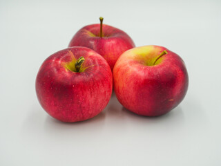 Three Florina type apples in studio