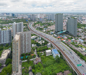 Obraz premium Aerial view of cars driving on highway or moterway. Overpass bridge street roads in connection network of architecture concept. Top view. Urban city, Bangkok, Thailand.