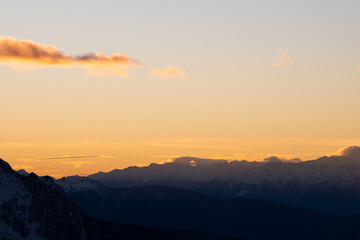 sunset in the dolomites covered by snow