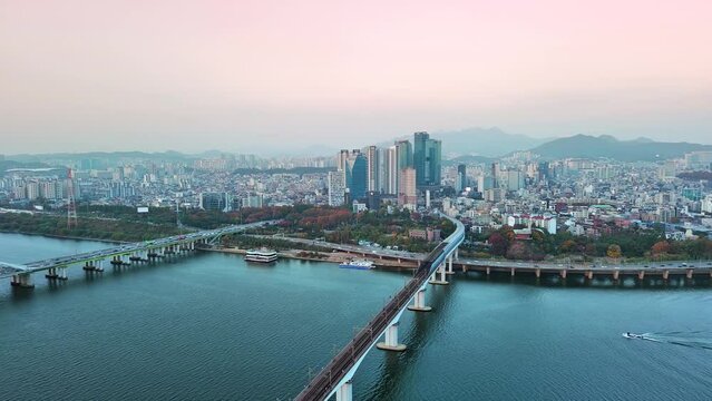 Seoul: Aerial view of capital city of South Korea, skyline of Hapjeong-dong with modern buildings (skyscrapers) at sunset, tree foliage in autumn colors - landscape panorama of Eastern Asia from above