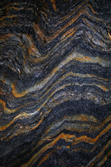 Naklejka premium Rocky shapes on the beach. textures and patterns generated on the stones of the Asturian beaches