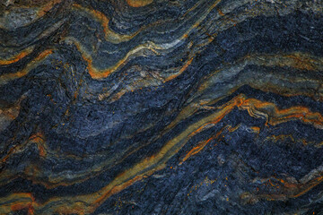 Naklejka premium Rocky shapes on the beach. textures and patterns generated on the stones of the Asturian beaches