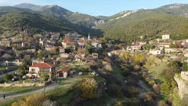 Aerial view of scenic Doganbey village on a sunset light, Turkey