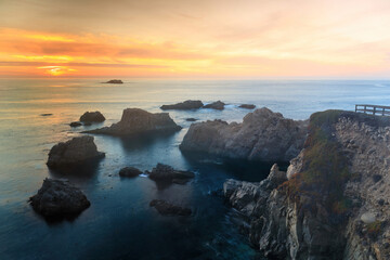 Fototapeta na wymiar California Rugged Coastline Sunset via Garrapata State Park. Carmel-by-the-Sea, Big Sur, California, USA.