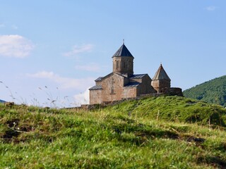 Gergeti Trinity Church in Kazbegi at sunrise. Georgia.