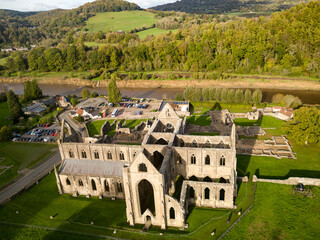 Aerial view of an ancient ruined cistercian monastery (Tintern Abbey, Wales. Built circa 12th...