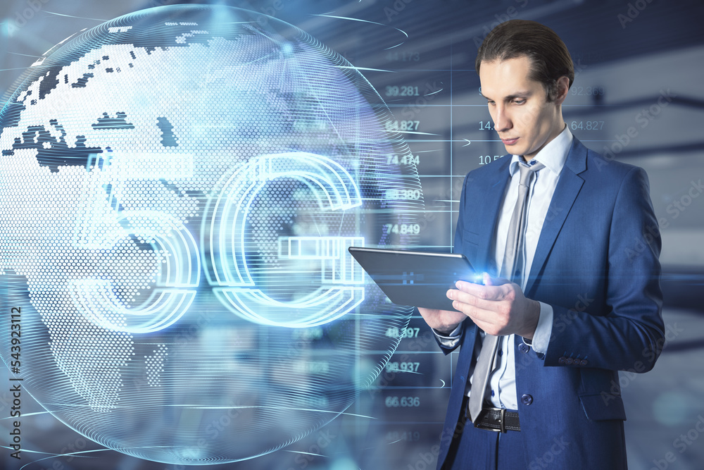 Poster  businessman using tablet with glowing planet earth globe hologram with 5G and index graph on blurry office interior background. Mobile internet network, speed and signal. Double exposure.
