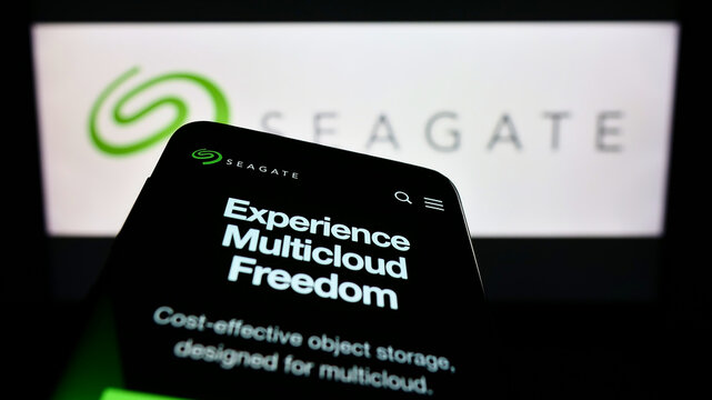 Stuttgart, Germany - 10-27-2022: Mobile phone with website of US data storage company Seagate Technology LLC on screen in front of logo. Focus on top-left of phone display.