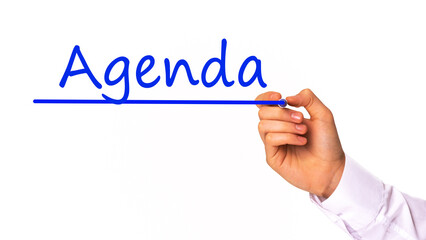 hand writing Agenda subscription with marker, concept, the letters in blue