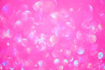 Texture and background of bukeh of various colors, especially purples, pinks, and white of different sizes and perfect for backgrounds and textures for graphic design