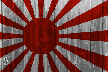 Japanese navy imperial flag on a textured background. Concept collage.