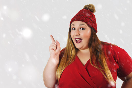 surprised plus size woman pointing finger for christmas poster