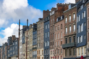 Honfleur, beautiful city in France, the harbor, houses on the quay 
