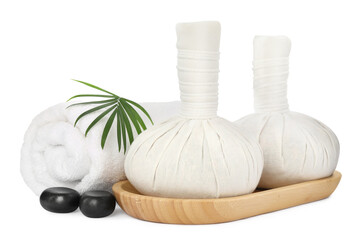 Fototapeta na wymiar Herbal massage bags, spa stones, towel and green leaf on white background