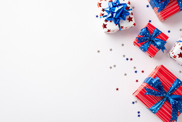 Forth of July celebration concept. Top view photo of present boxes with ribbon bows and star shaped...