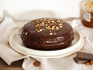 Sacher Torte, a chocolate cake originating from Austria, it has layers filled with apricot jam and covered in chocolate ganache