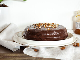 Sacher Torte, a chocolate cake originating from Austria, it has layers filled with apricot jam and covered in chocolate ganache
