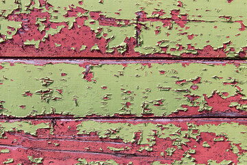 Old weathered green painted wooden wall for background or banner
