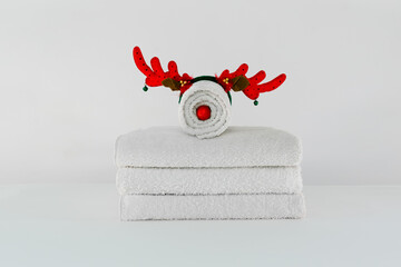 A folded towel with Christmas horns