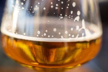closeup of draft beer in wine glass