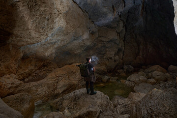 Photographer shooting in a cave
