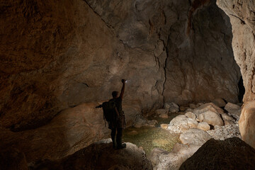Photographer shooting in a cave