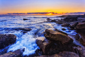 Sea Whale rocks sun wave