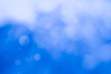 Abstract blurry blue color for background, Blur festival lights outdoor celebration and blue bokeh focus decorative.