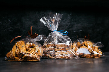 Homemade Italian Cantuccini with Almonds on a White Plate, side view. Crispy Almond Cookies.