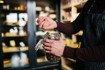 Aromatic Chinese tea. Chinese tea in a jar. Blurred background.