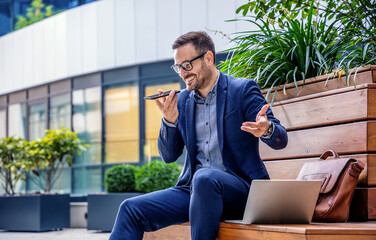 Business people. Happy businessman talking about good news with his colleagues. Business, lifestyle concept