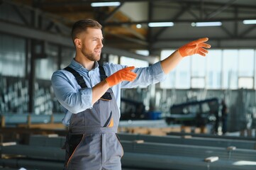 Factory worker. Man working on the production line.