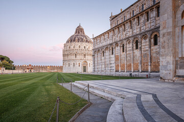 surroundings of the tower of pisa at dawn