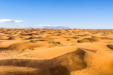 Fototapeta na wymiar Sand dunes in Utah desert in a windy day