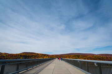 A colorful Autumn view on Cantilever bridge in Walkway Over the Hudson State Historic Park 