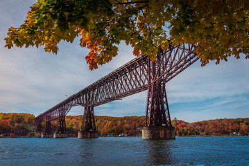 An Autumn view of  Cantilever bridge in Walkway Over the Hudson State Historic Park  - obrazy, fototapety, plakaty