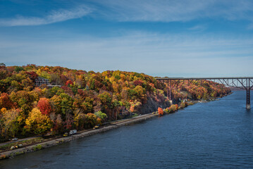 An Autumn view of the Hudson river bank from  the mid-Hudson bridge in New York state 