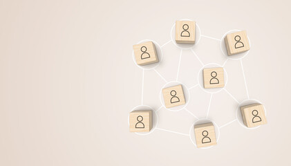 Wooden blocks connected together on brown background. Cooperation, teamwork, network and community concept. 3D illustration.