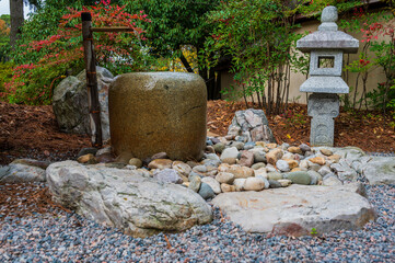 Stone Lateran And Fountain In Garden 