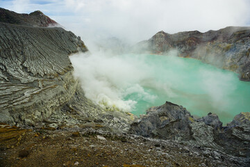 The view of kawah Ijen, the biggest acid lake in the world. Located in banyuwangi city, east java, indonesia.