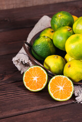 Fototapeta na wymiar Green orange, a fresh fruit rich in vitamins